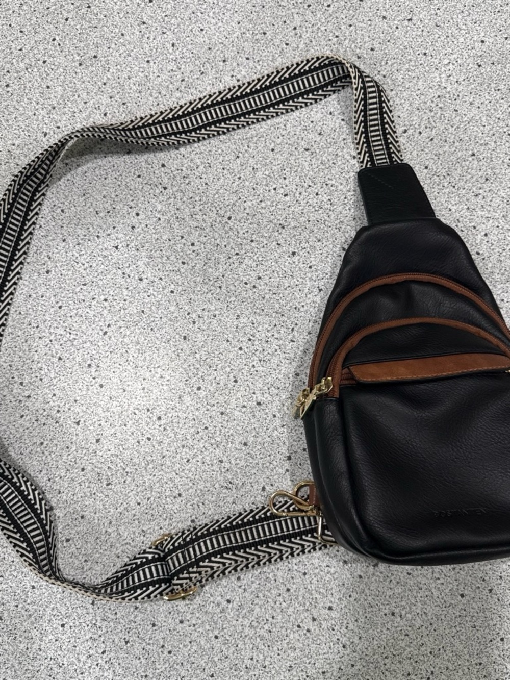 Black Leather Crossbody Sling Bag with Brown Trim
